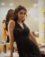 Fashionable Actress Kanika Mann in a black quilted halter neck dress photos 04