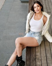 Hot Beauty Yesha Sagar in a White Sleeveless Tank Top with Mini Denim Shorts Photos 04
