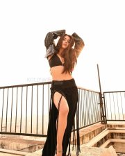 Kudi Badi Cutie Actress Roshni Walia in a Black Triangle Bikini Top and a High Waisted Maxi Skirt with Thigh High Double Slits Pictures 04