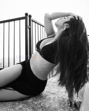 Kudi Badi Cutie Actress Roshni Walia in a Black Triangle Bikini Top and a High Waisted Maxi Skirt with Thigh High Double Slits Pictures 11