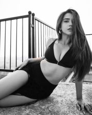 Kudi Badi Cutie Actress Roshni Walia in a Black Triangle Bikini Top and a High Waisted Maxi Skirt with Thigh High Double Slits Pictures 12