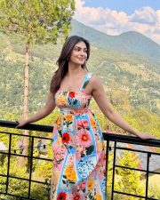 Radiant Actress Yesha Sagar in a Colorful Floral Print Square Neck Mini Dress Photos 04