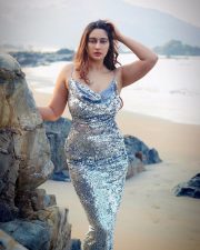 Sensual Megha Shukla in a Silver Sequined Dress with a Cowl Neckline Photos 04