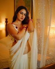 Sexy Megha Shukla in a White Saree and Printed Sleeveless Blouse Photos 01