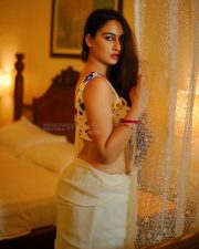 Sexy Megha Shukla in a White Saree and Printed Sleeveless Blouse Photos 03