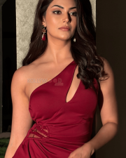 Sophisticated Actress Yesha Sagar in a Maroon One Shoulder Cutout Gown Photos 01