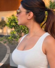 Stylish Cleavage Yesha Sagar in a White Ribbed Scoop Neck Tank Top Photos 03