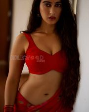 Sultry Actress Megha Shukla in a Red Floral Saree With Red Blouse Photos 01