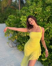 Sunny Actress Yesha Sagar in a Bright Yellow One Shoulder Ruched Asymmetric Mini Dress Photos 02