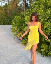 Sunny Actress Yesha Sagar in a Bright Yellow One Shoulder Ruched Asymmetric Mini Dress Photos 04