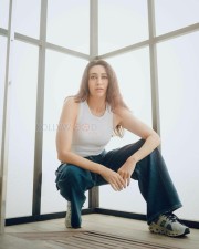 Actress Karisma Kapoor in a Classic Jeans and White Top Photos 01