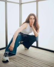 Actress Karisma Kapoor in a Classic Jeans and White Top Photos 03