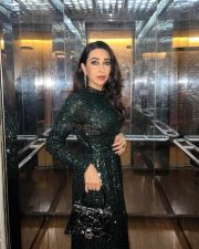 Actress Karisma Kapoor in a Green Sequin Dress Photos 01