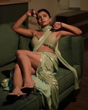 Alluring Ruchira Jadhav in a Light Green Shimmery Draped Saree with a Halter Neck Blouse Photos 01