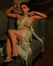 Alluring Ruchira Jadhav in a Light Green Shimmery Draped Saree with a Halter Neck Blouse Photos 03