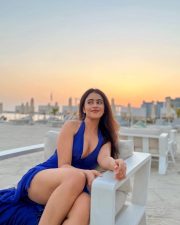 Alluring Shobhita Rana Cleavage in a Royal Blue Deep V Dress Photos 01