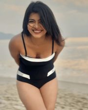 Attractive Ruchira Jadhav in a Black and White One Piece Swimsuit Photos 01
