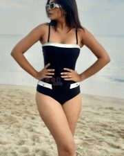 Attractive Ruchira Jadhav in a Black and White One Piece Swimsuit Photos 03