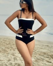 Attractive Ruchira Jadhav in a Black and White One Piece Swimsuit Photos 03