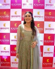 Bollywood Actress Karisma Kapoor in a Green Anarkali Dress Pictures 03