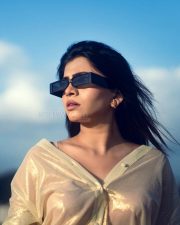 Dazzling Actress Ruchira Jadhav in a Gold Sheer Off Shoulder Top Photos 02