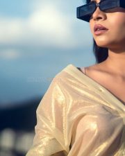 Dazzling Actress Ruchira Jadhav in a Gold Sheer Off Shoulder Top Photos 04