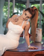 Sexy Ankita Dave in a White Strapless Halter Neck Tube Dress Photos 02