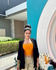 Sexy Shobhita Rana in an Orange Crop Top Black Jacket and Beige Pant Pictures 02