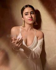 Stunning Beauty Shobhita Rana in a White Deep Neck Cleavage Blouse with a Flowy Skirt and Sheer Dupatta Photos 02