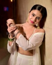 Stunning Beauty Shobhita Rana in a White Deep Neck Cleavage Blouse with a Flowy Skirt and Sheer Dupatta Photos 04