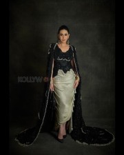 Stunning Karisma Kapoor in a Black and Silver Bodycon Dress Photos 02