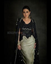 Stunning Karisma Kapoor in a Black and Silver Bodycon Dress Photos 03