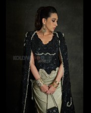 Stunning Karisma Kapoor in a Black and Silver Bodycon Dress Photos 04