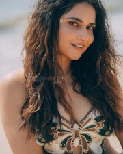 Winsome Actress Prisha Singh in a Embroidered Butterfly Crop Top And White Mini Skirt Photos 01