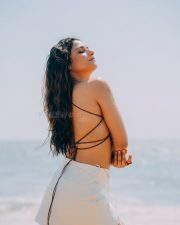 Winsome Actress Prisha Singh in a Embroidered Butterfly Crop Top And White Mini Skirt Photos 02