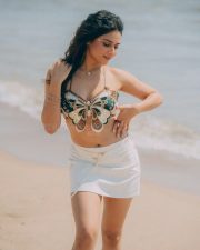 Winsome Actress Prisha Singh in a Embroidered Butterfly Crop Top And White Mini Skirt Photos 06