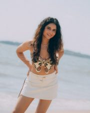 Winsome Actress Prisha Singh in a Embroidered Butterfly Crop Top And White Mini Skirt Photos 07