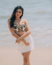 Winsome Actress Prisha Singh in a Embroidered Butterfly Crop Top And White Mini Skirt Photos 08
