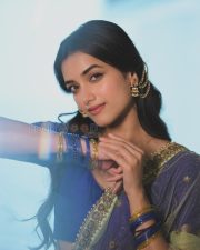 Elegant Actress Bhagyashri Borse in a Purple Embroidered Lehenga Photos 01