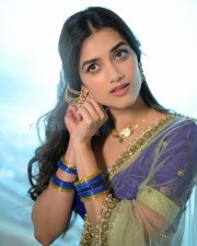 Elegant Actress Bhagyashri Borse in a Purple Embroidered Lehenga Photos 04