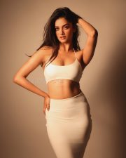 Sexy Bhagyashri Borse in a White Halter Bralette with a High Waisted Cream Colored Bodycon Skirt Photos 05