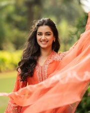 Seyon Movie Heroie Bhagyashree Borse in a Vibrant Orange Anarkali Suit with White Floral Embroidery Photos 02 Seyon Movie Heroie Bhagyashree Borse in a Vibrant Orange Anarkali Suit with White Floral Embroidery Photos 02