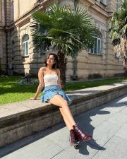 Stylish Bhagyashri Borse Legs in a white tube crop top denim mini skirt Photos 01 Stylish Bhagyashri Borse Legs in a white tube crop top denim mini skirt Photos 01