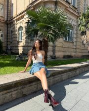 Stylish Bhagyashri Borse Legs in a white tube crop top denim mini skirt Photos 03 Stylish Bhagyashri Borse Legs in a white tube crop top denim mini skirt Photos 03