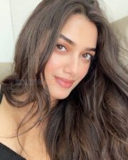 Winsome Actress Bhagyashri Borse in a Black Cami Top Photos 01
