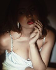 Alluring Srushti Bannatti in a White Ruched Cowl Neckline Bodycon Dress Photos 05