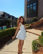 Attractive Jiya Shankar in a White Corset Style Mini Dress Photos 02