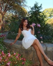 Attractive Jiya Shankar in a White Corset Style Mini Dress Photos 03