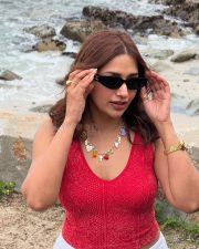 Beautiful Jiya Shankar in a Red Sleeveless Crop Top and White Skirt Pictures 02