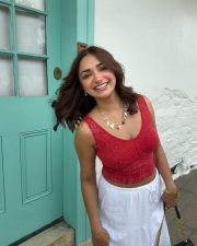 Beautiful Jiya Shankar in a Red Sleeveless Crop Top and White Skirt Pictures 04